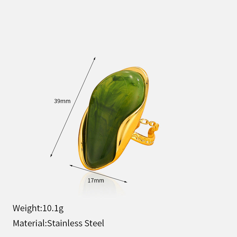 Measurement diagram: green ring, stone 39 mm by 17 mm, weight 10.1 g, material given as stainless steel