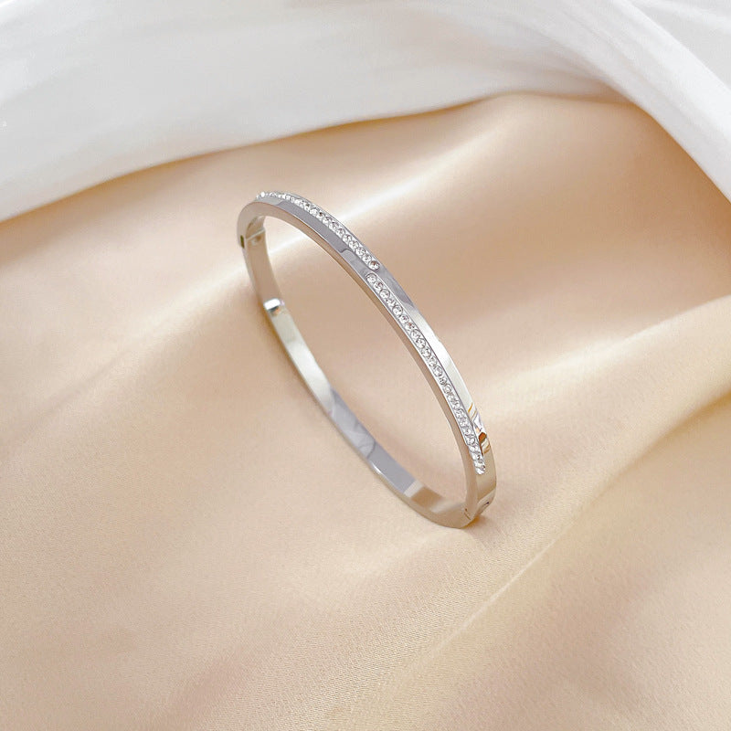 Pavé line bracelet in titanium steel – worn on wrist