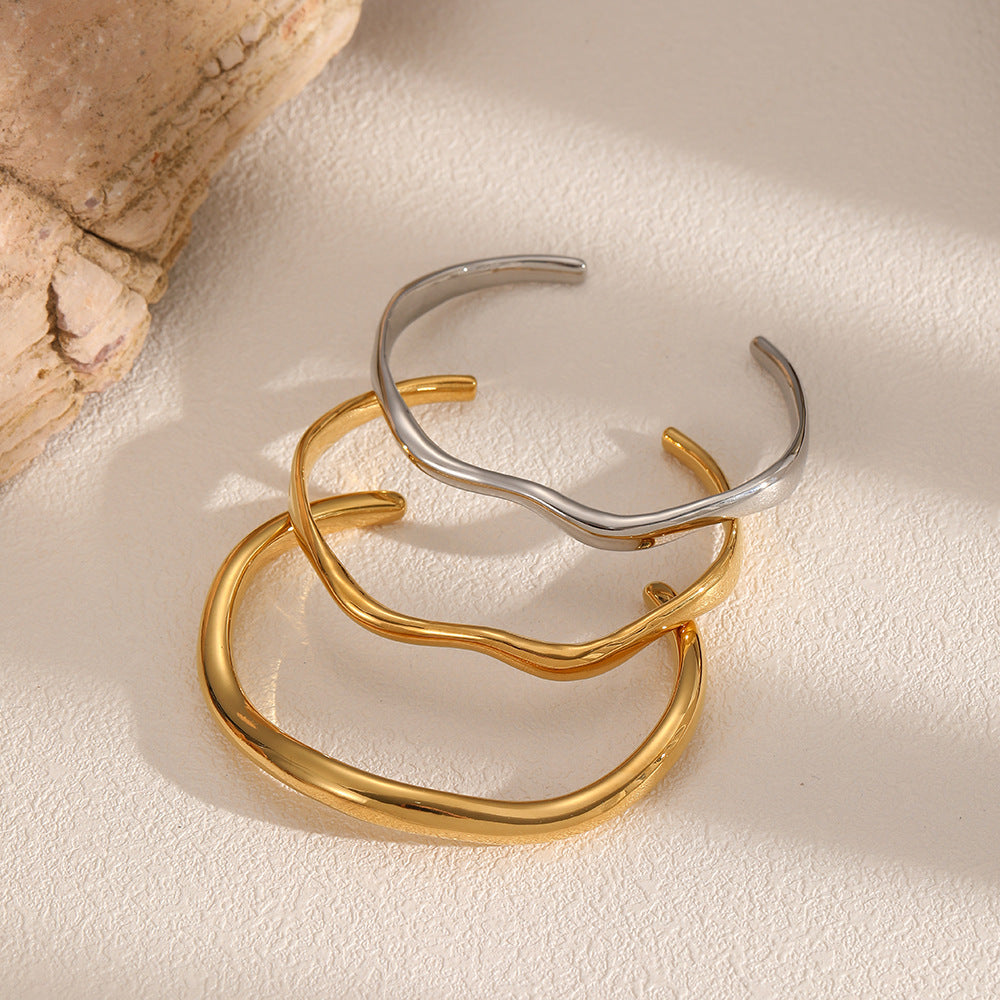 Irregular open cuff bracelet in nickel-free 316L stainless steel – main view