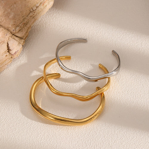 Irregular open cuff bracelet in nickel-free 316L stainless steel – main view