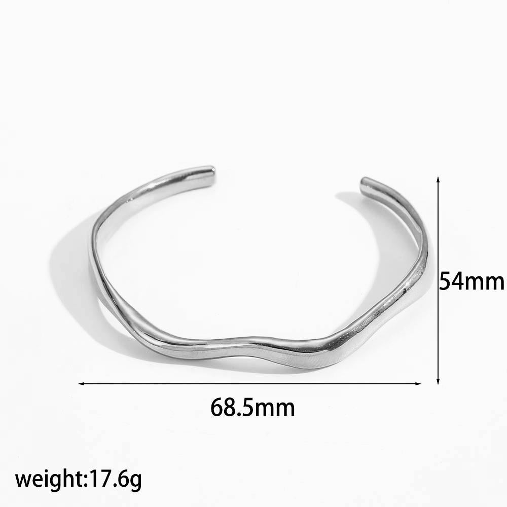 Irregular open cuff bracelet in stainless steel – silver tone