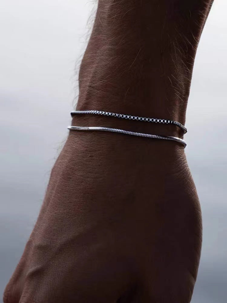 Double-layer bracelet in stainless steel – flat lay